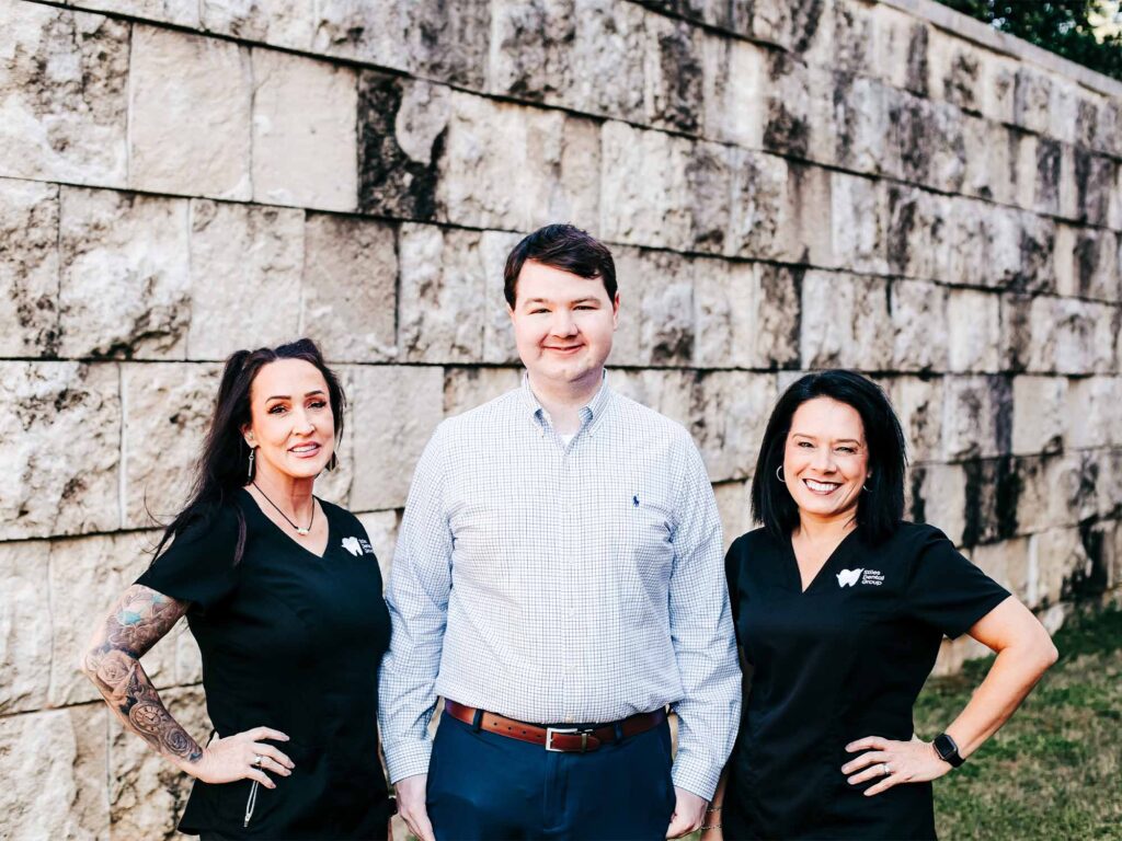 group photo of Dr. Stiles, Danelle, and Shannon